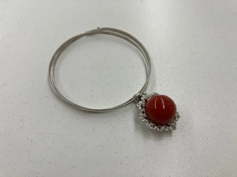 サンゴダイヤ0.13ct Pt900・750