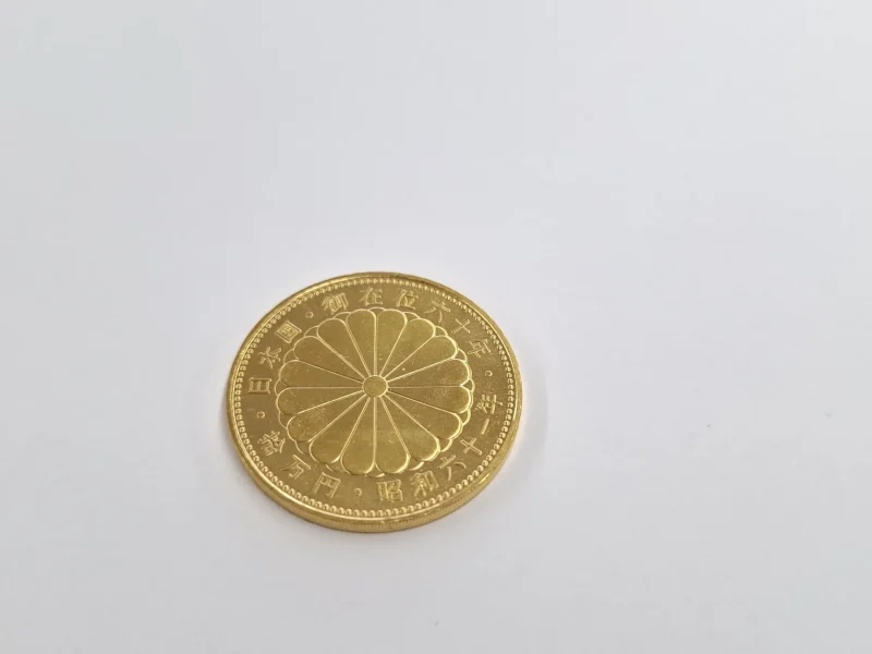 御在位六十年記念 10万円金貨